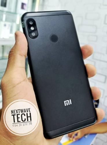 #REDMI_6_PRO  
avec housse gomme, cable sy b ...