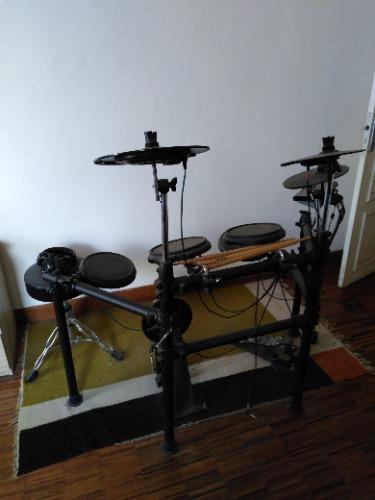 La Batterie électronique FAME DD-5200 est une ...